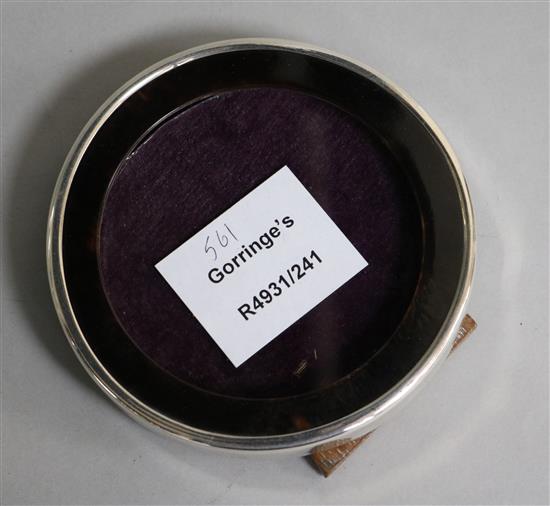 A George V silver and tortoiseshell mounted circular photograph frame, Birmingham, 1919, 10.1cm.